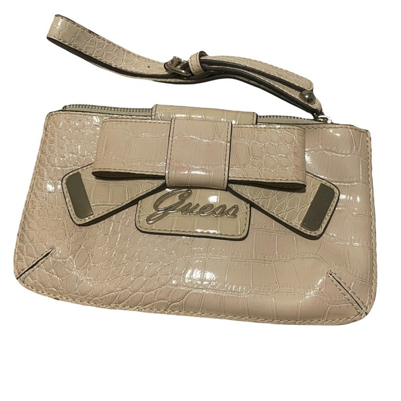 Guess Handbags - Guess wristlet crocodile embossed faux leather cream colored clutch